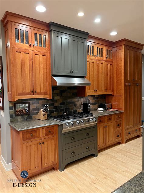 stainless steel vs slate appliance against honey oak cabinets|honey oak cabinets green.